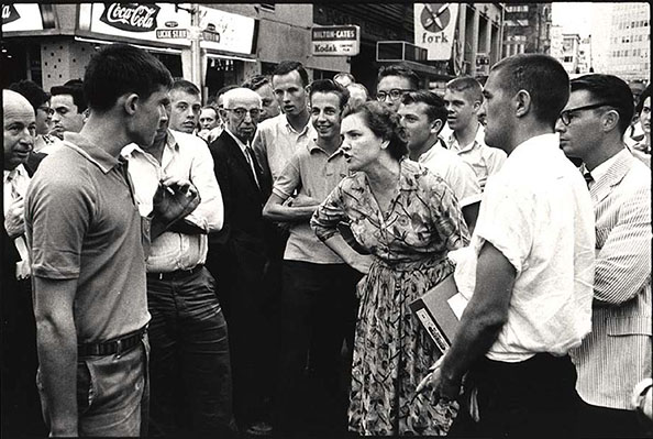 Danny Lyon Woman holds off a mob, Atlanta, 1963