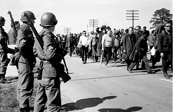 Steve Schapiro Troopers Watching Marchers, Selma to Montgomery, 1965
