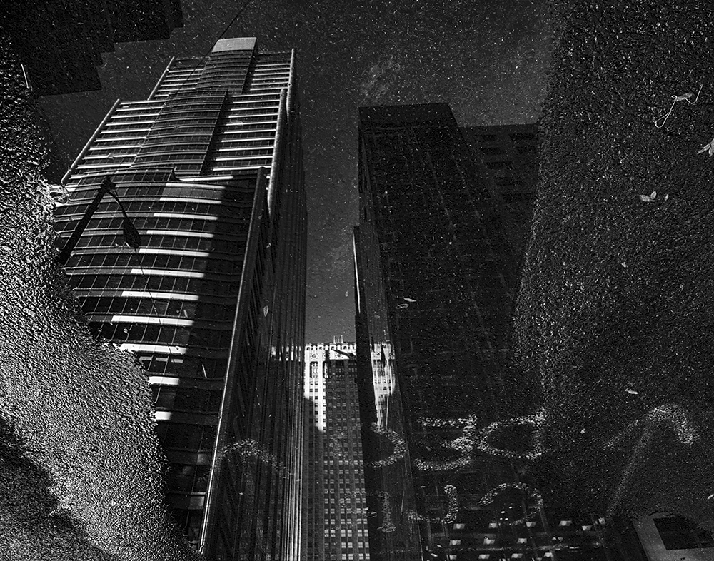 Puddle reflections, downtown Chicago