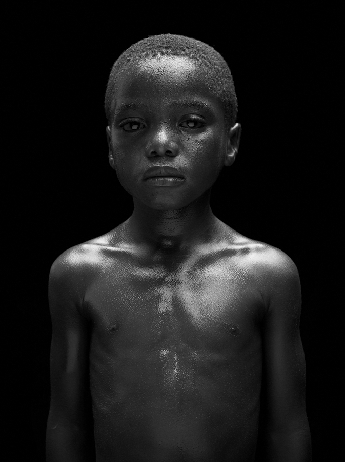 1st Place Winner - Portrait Photographer of the Year 2015 Boxing Kid by Sandro Baebler (Switzerland) 