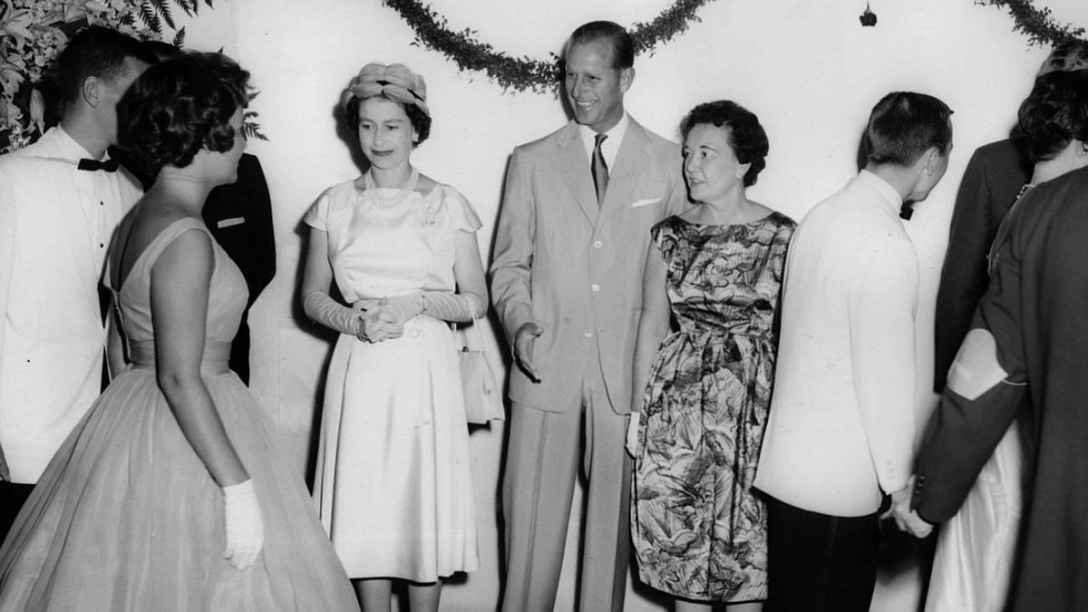 Chicago Tribune historical photo Queen Elizabeth II, from left, Prince Philip and Chicago's first lady Eleanor "Sis" Daley greet visitors at a reception at the Drake Hotel on July 7, 1959. 