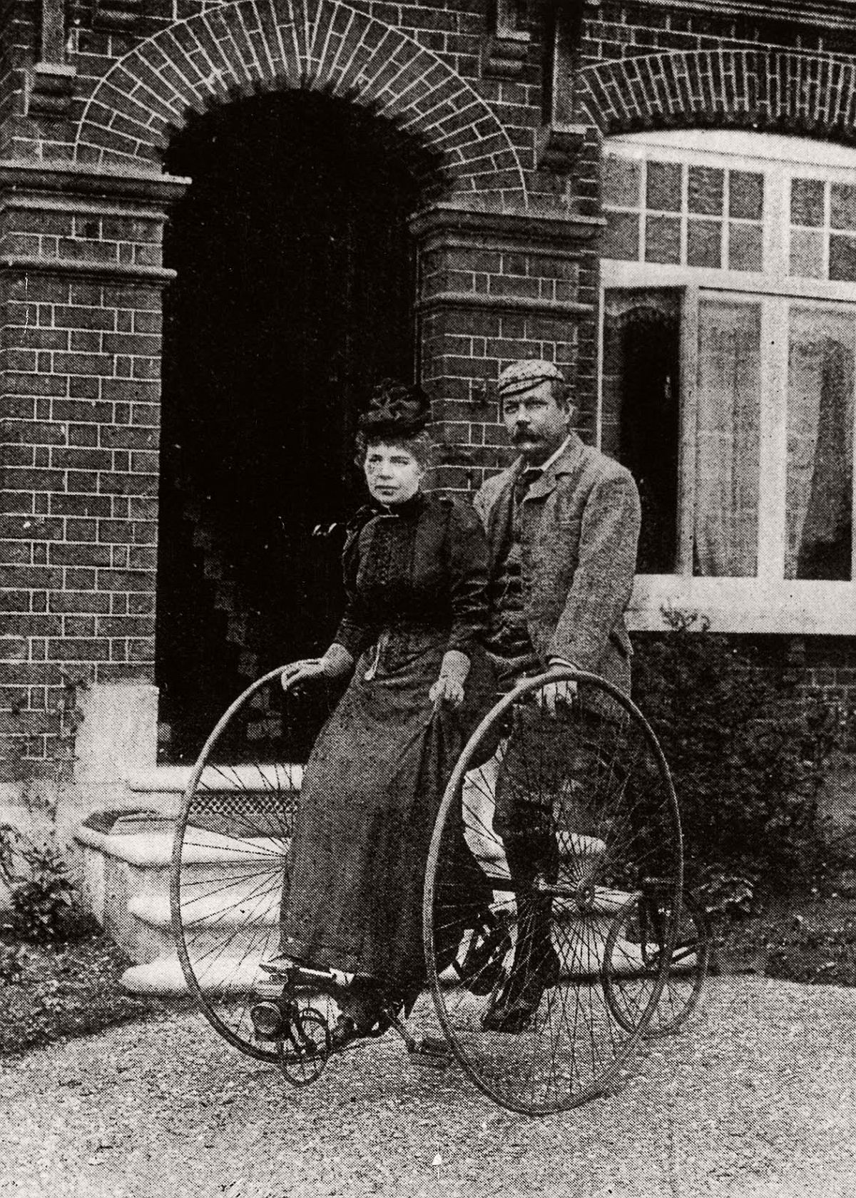 Sir Arthur Conan Doyle and his wife ride a tandem tricycle, 1895. (Getty Images)