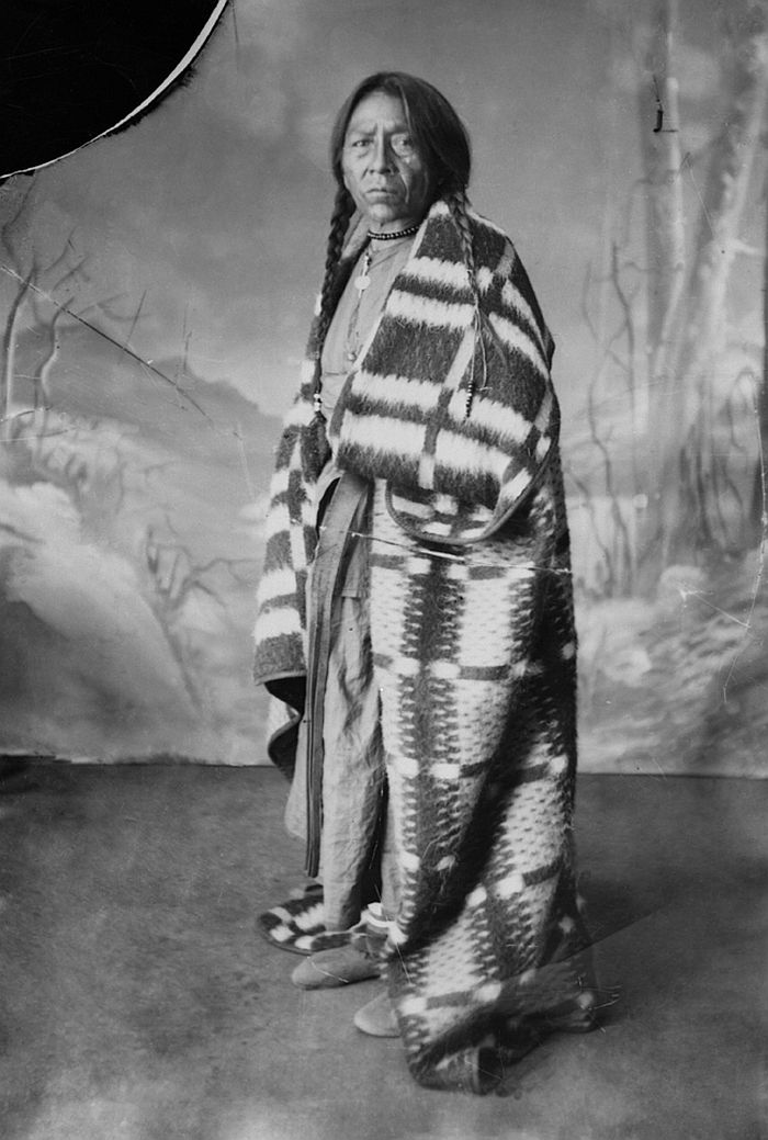 First Nations man in blanket, ca. 1886-90