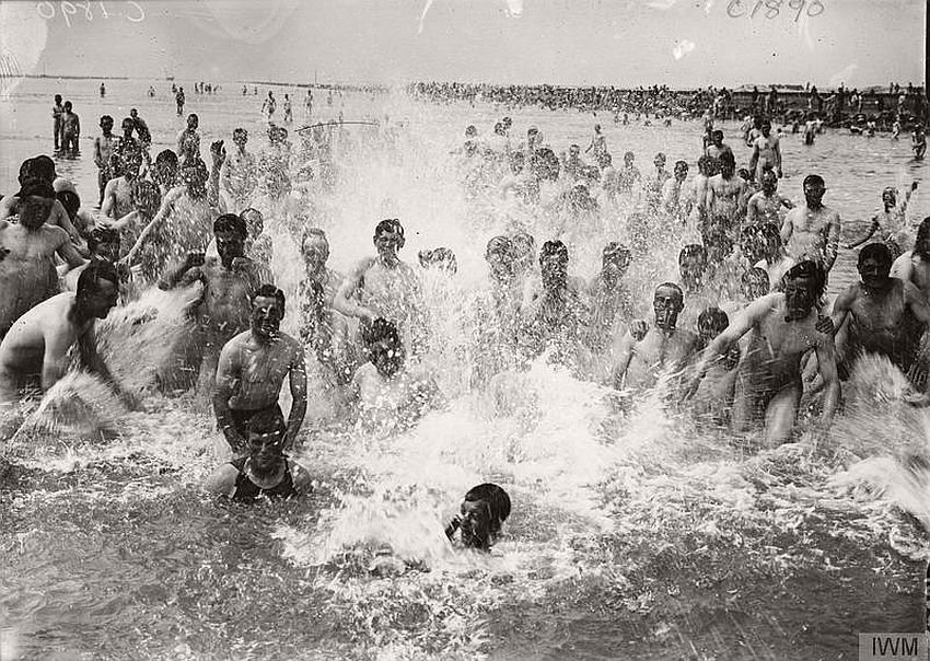 Enthusiastic splashing in the sea at Etaples, France, 1917.