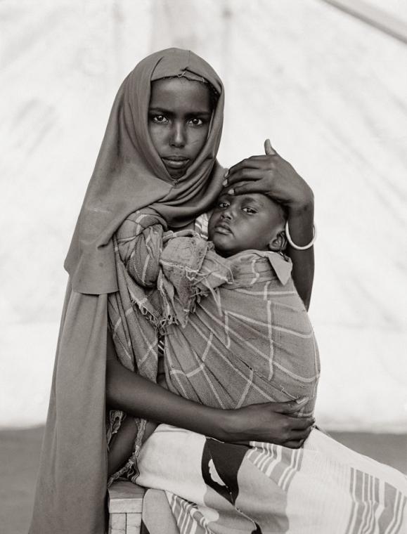 Fazal Sheikh, Alima Hassan Abdullai and her brother Mahmoud, Somali refugee camp, Mandera, Kenya, 1993, from the series A Camel for the Son. © Fazal Sheikh