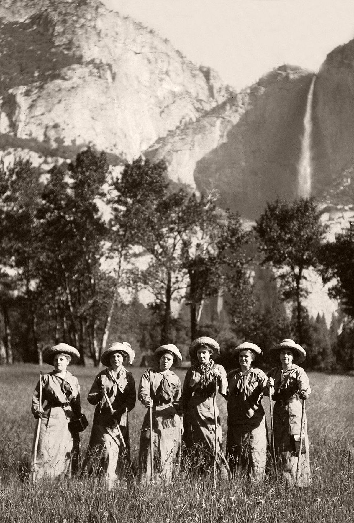Tourists pose for a picture in front of Yosemite Falls, c.1900. (Jonathan Kirn/Corbis via Getty Images)