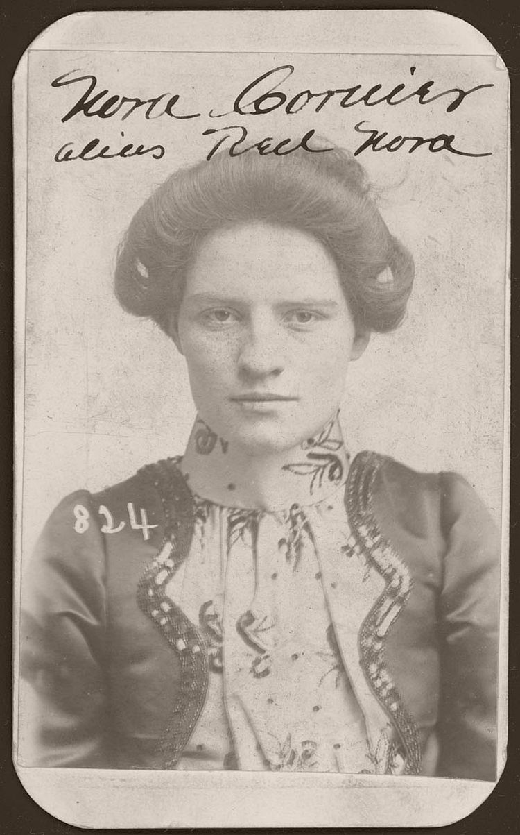 Meet Nora Courier, better known as "Red Nora." On March 31, 1901, Omaha police arrested Nora for stealing a horse. According to police court records, she was 22 years old and stood 5 feet, 3 inches tall. She had slate blue eyes and a scar on the center of her forehead.