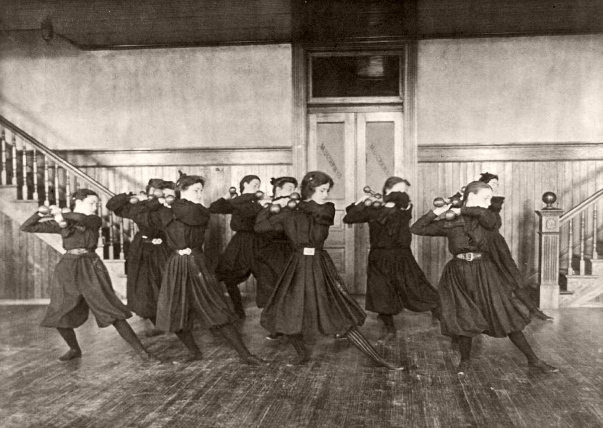 Female students exercising with dumbbells, Western High School, Washington, DC, 1899