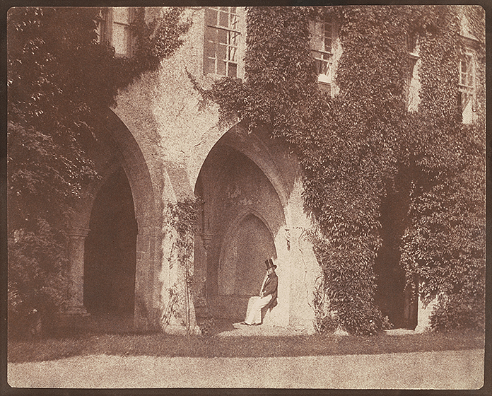 William Henry Fox Talbot, The Reverend Calvert Jones in the Cloisters at Lacock Abbey, 1845, salted paper print, National Gallery of Art, Washington, Promised Gift of Robert B. Menschel