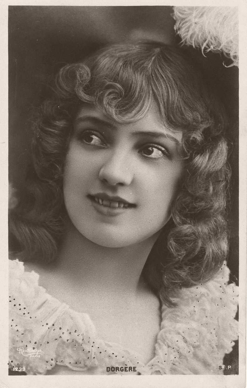 Arlette Dorgère (born Anna Mathilde Irma Jouve; 1880 – 1965) was a French actress, dancer and singer. She was represented on a large number of postcards of the Belle Époque and also a model for posters.