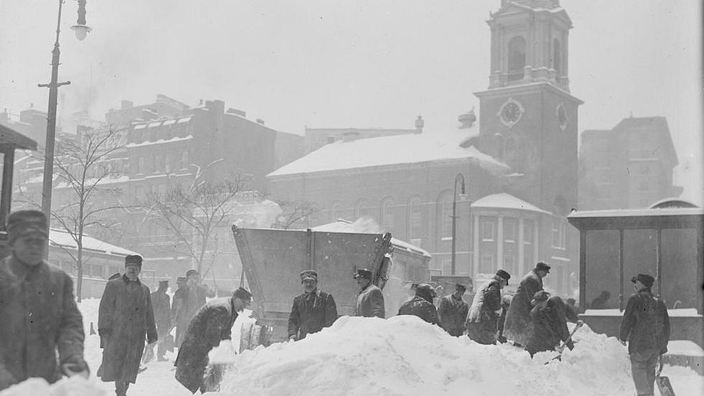 Circa 1916. Severe snowstorm reaches Boston, clearing snow at corner of Park and Tremont St.