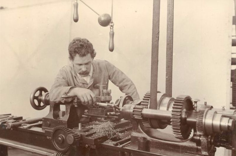 Bill Courtney at his lathe in the Molton Street works, c1905