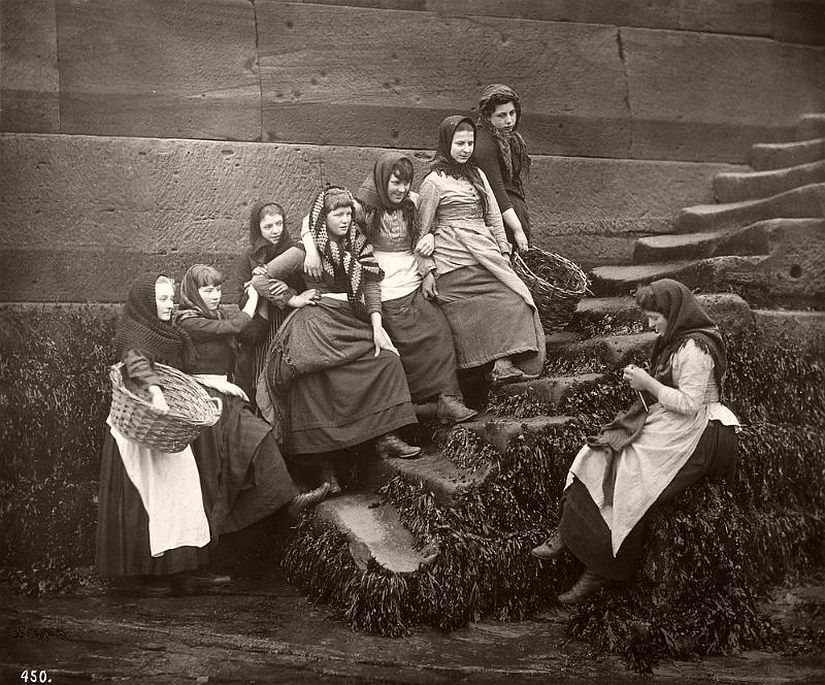 A group of fishing girls in the stairs down to the beach, Whitby