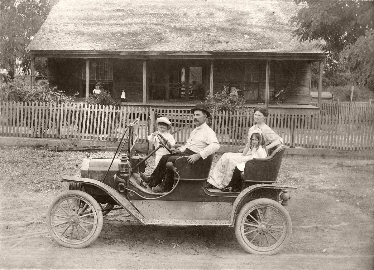 Unidentified family in a Ford Model T Tourabout, c1910