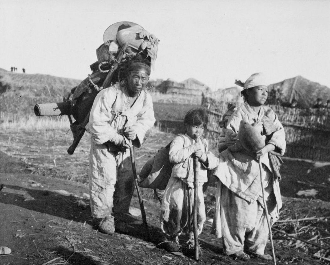 A small family of Korean refugees fleeing the Japanese Army. Korea.,1904.