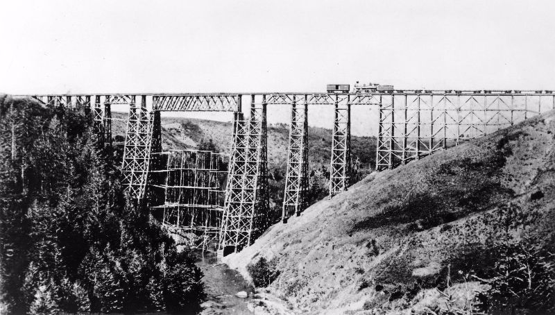 Montana's massive 214 foot high Two Medicine Creek timber trestle on the Great Northern Railway.