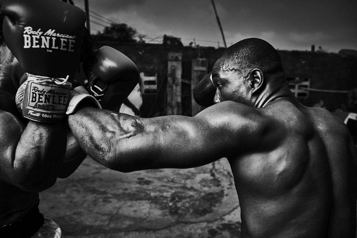 From right - Boxers Atu Rikkets and Ernest Amuzu sparring during training at "Charles Quartey Boxing Foundation" in Accra, Ghana, on September 29th, 2017.