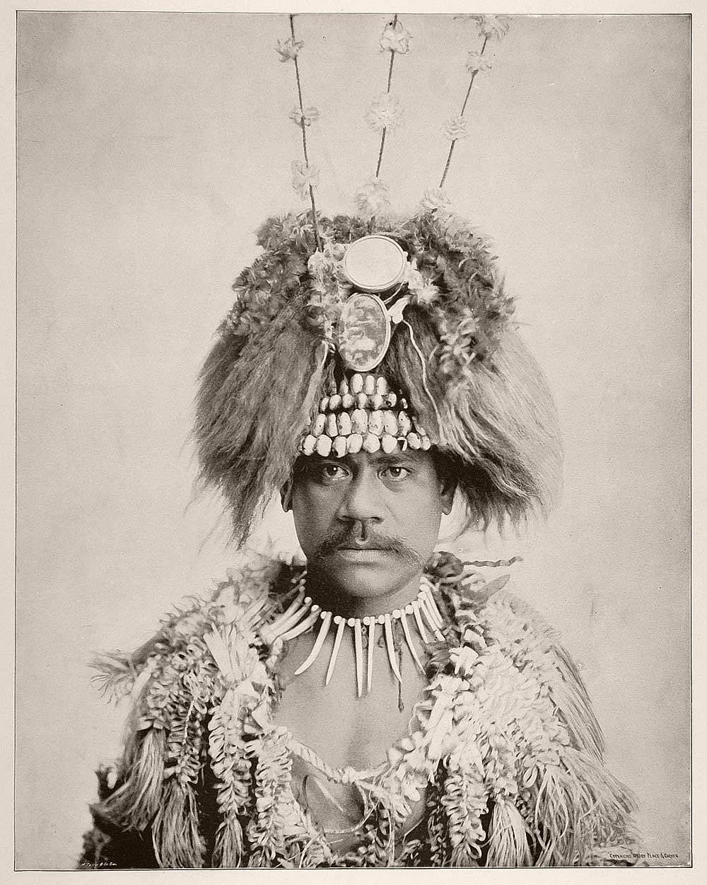 William, a Samoan man, in his traditional costume and elaborate headdress.