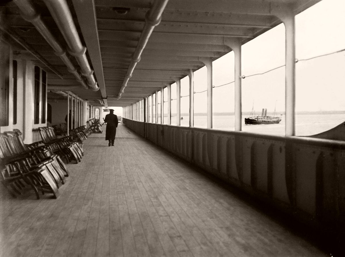 Promenade deck of the Titanic, after leaving Southampton and passing the Portuguese RMSP Tagus, 1912.