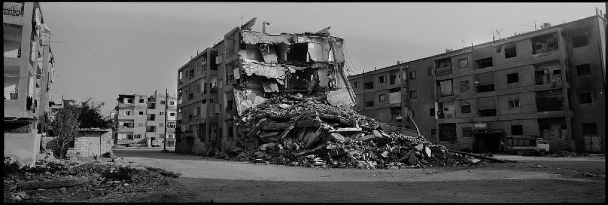 an apartment block lies half destroyed in Raqqa, Syria, Sunday, November 11, 2018. © Victor J. Blue