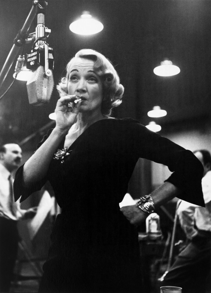 USA. New York. American actress Marlene DIETRICH at Columbia records's studios. Part of a sequence showing Marlene Dietrich during a recording session when she was 51 years old, with her famous World War II songs including Lilli Marlene. 1952 © Eve Arnold | Magnum Photos