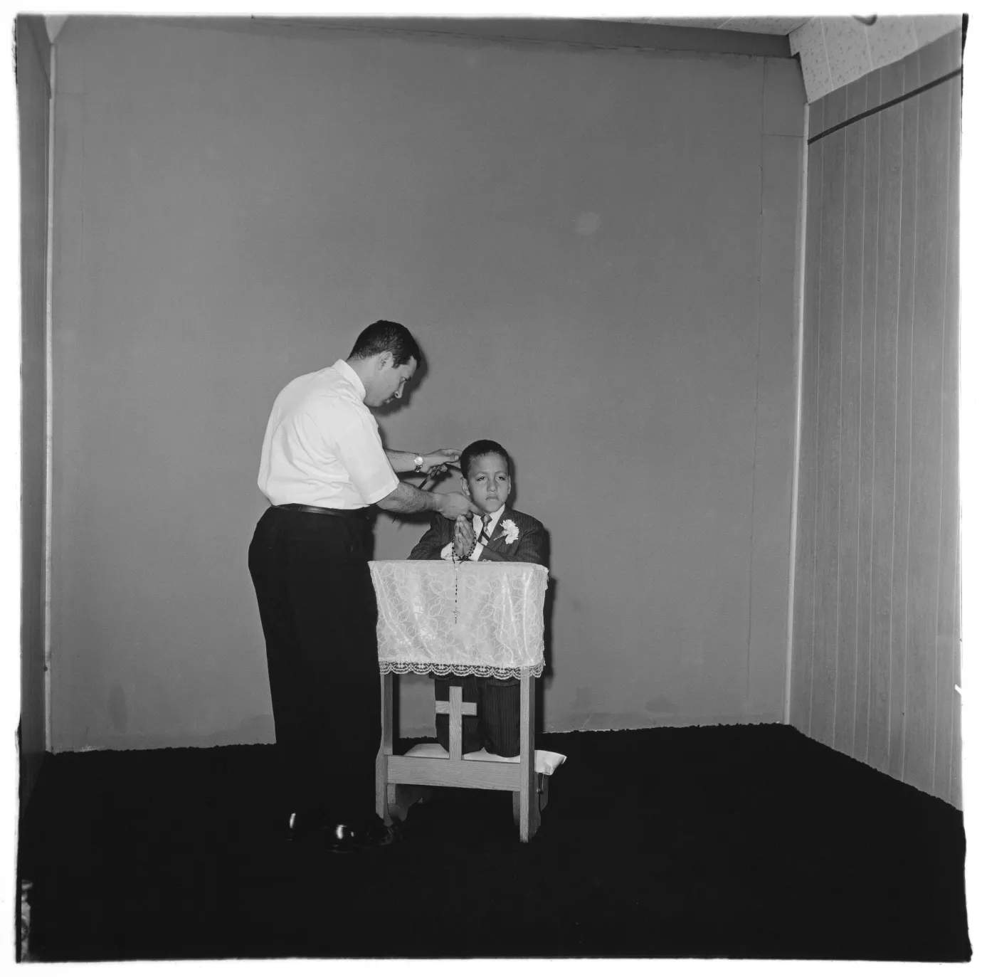  Photographer posing communion boy, N.Y.C. 1968 gelatin silver print, 20 x 16 inches (sheet) [50.8 x 40.6 cm]
