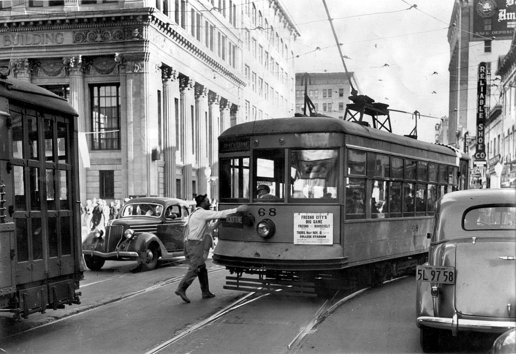 A Fresno streetcar stuck in traffic, in 1938. (Fresno Beehive)
