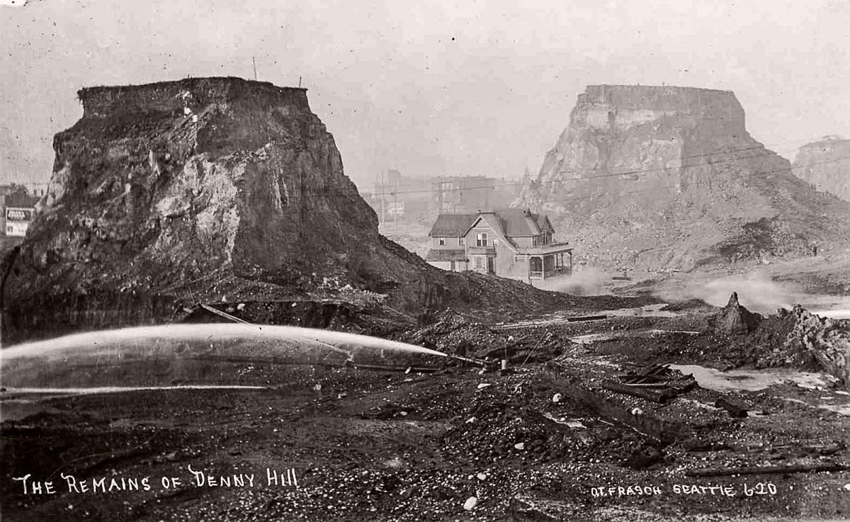 Denny Hill is slowly washed away by powerful water cannons. 1910.