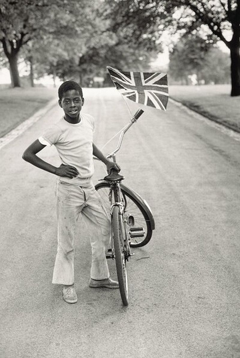 Vanley Burke, Boy with Flag, Winford in Handsworth Park, 1970, printed 2022, gelatin silver print, National Gallery of Art, Washington, Alfred H. Moses and Fern M. Schad Fund