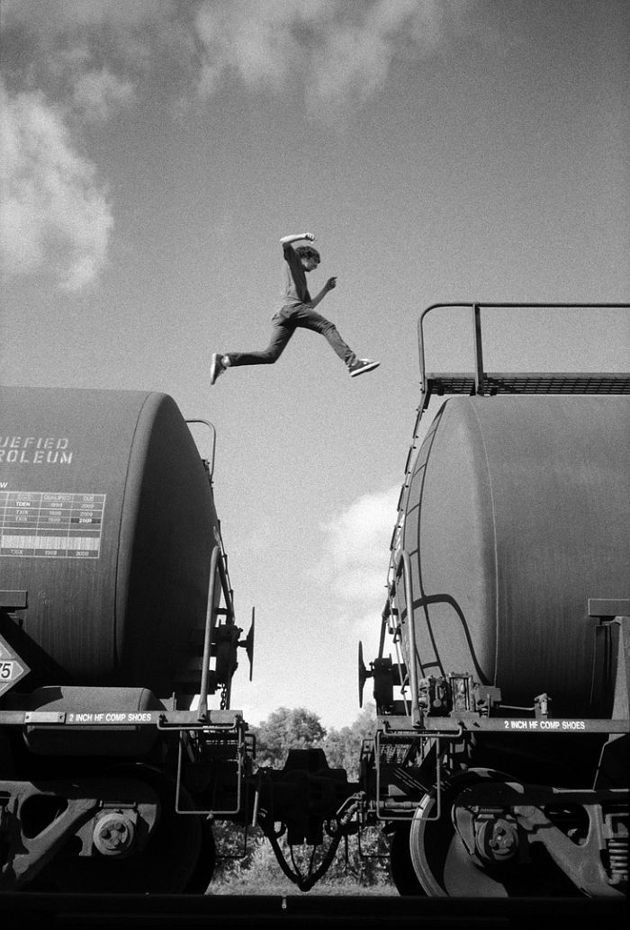 Ed Templeton, Matt Bennett jumps between trains, Bethlehem, Palestine, 2005. Courtesy of the artist. 